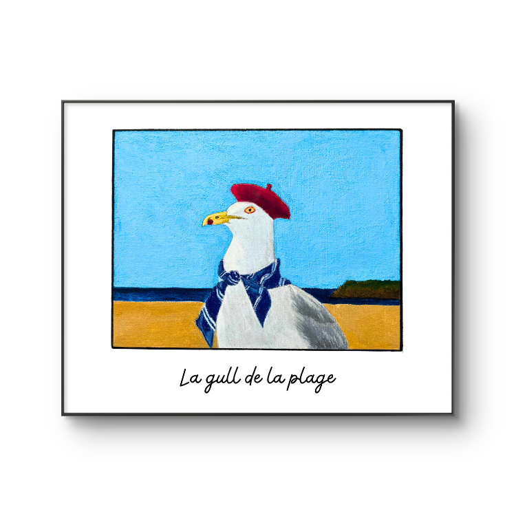 Framed artwork of a seagull wearing a red beret and blue scarf on a beach.